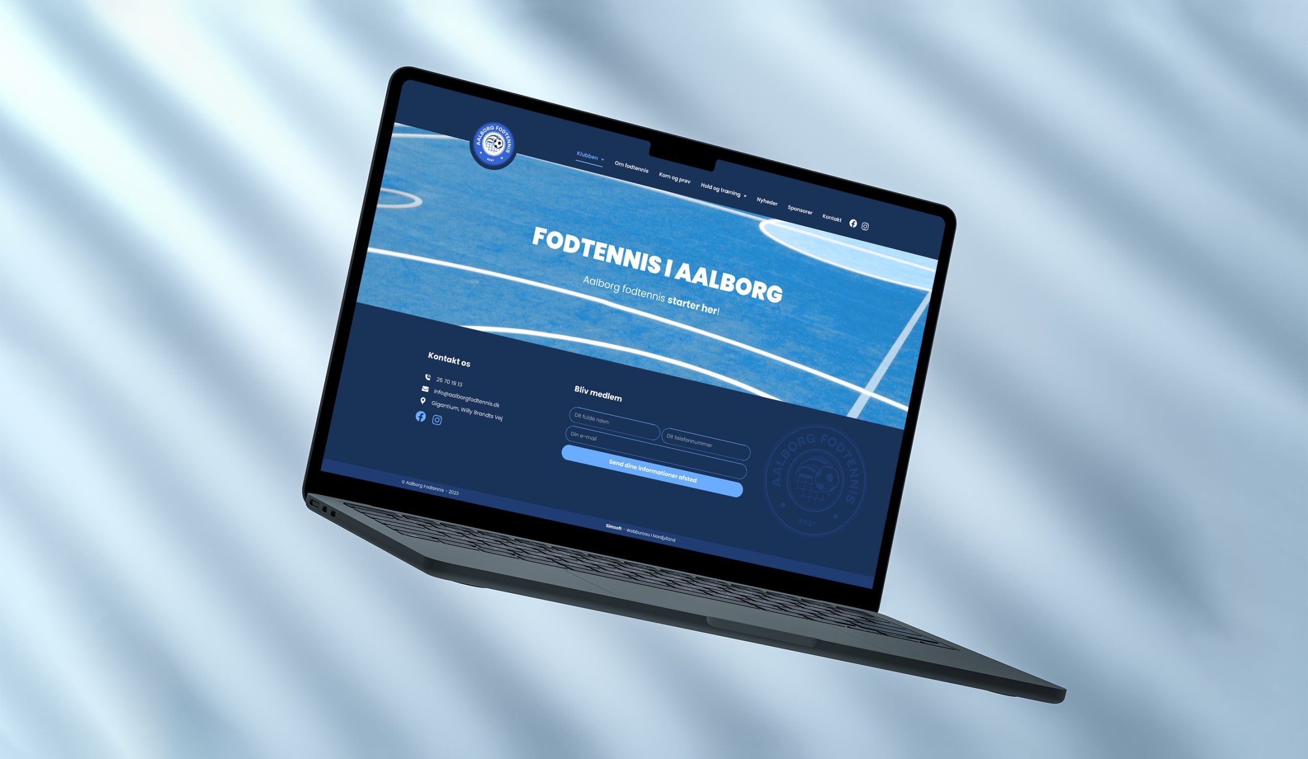 Laptop mockup af Aalborg Fodtennis' WordPress hjemmeside